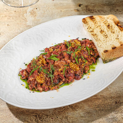 Тартар из говяжьей вырезки в Ива по цене 1160 ₽