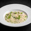 Ризотто с креветками, шпинатом и зеленым горошком в Capo Ristorante по цене 1400