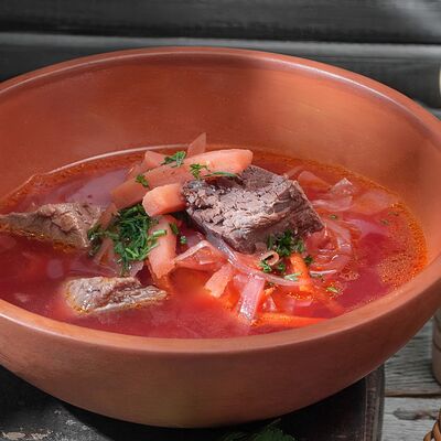 Борщ по-грузински с говядиной в Кацо по цене 430 ₽