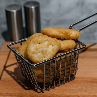 Куриные наггетсыв Doner home по цене 165 ₽