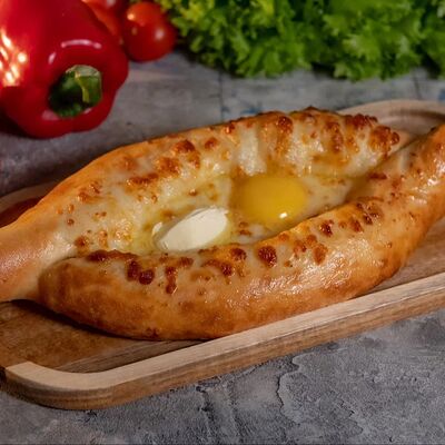 Хачапури лодочка с яйцом в Шашлычок по цене 1100 ₽