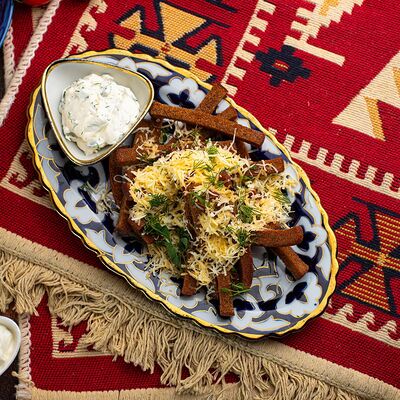 Гренки с чесноком и зеленью в Анхор по цене 365 ₽