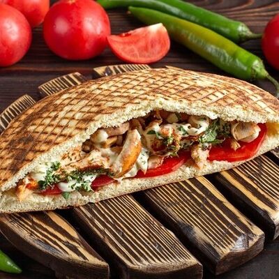 Шаурма в донаре со свининой в Kebab House по цене 450 ₽