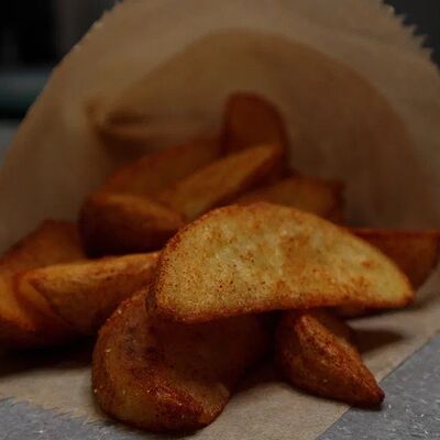 Картофельные дольки в Umami Kitchen's по цене 430 ₽