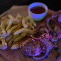 Шашлык свиной с картофелем фри и соусом аджика в Studio 46