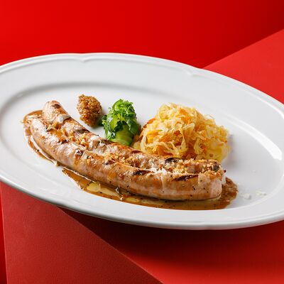 Колбаски с тушеной капустой в Hitch по цене 1670 ₽