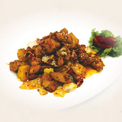 Кролик жареный с картофелем в воке в Золотая панда по цене 2551 ₽