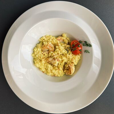 Ризотто с креветками и шафраном в Трюфель по цене 760 ₽