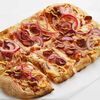 Пицца с колбасками и беконом в Pizzatta по цене 858