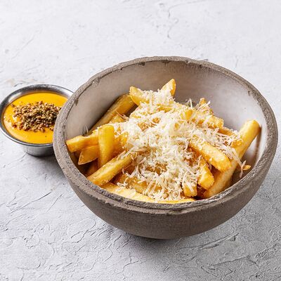 Картофель фри с манговым айоли и пармезаном в She по цене 380 ₽