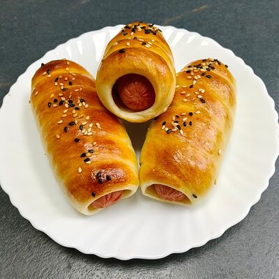 Сосиска в тесте в Плов халяль 1 по цене 90 ₽