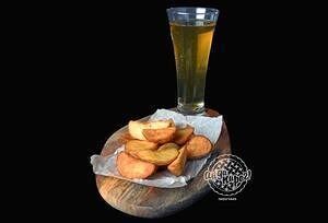 Картофель по-деревенски в АйДаПирог по цене 140 ₽