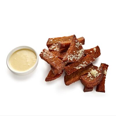 Ржаные гренки с чесночным соусом в Лаваш и мясо по цене 210 ₽