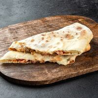 Кальцоне с ветчиной в Сан Суши - Пицца