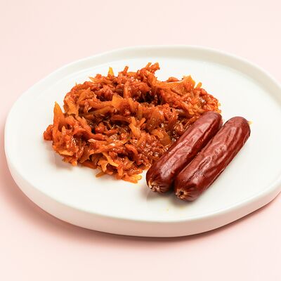 Колбаски с тушёной капустой в Кекслав по цене 490 ₽