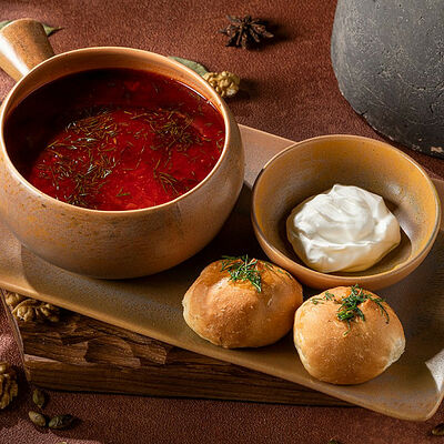 Борщ с пампушками в Джонджоли по цене 490 ₽