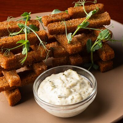 Гренки чесночные в Ноев Ковчег по цене 250 ₽