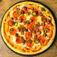 Пицца Охотничья средняя на тонком тесте 30см в KINZA