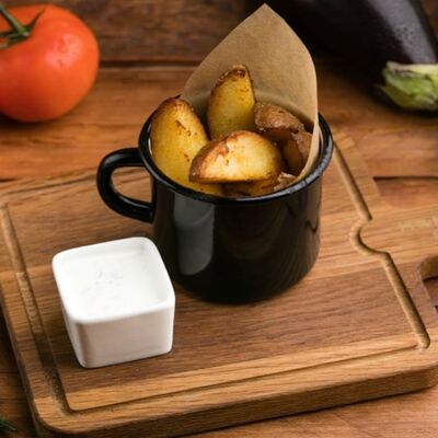 Картофель по-деревенски с соусом Чесночный мацони в Мама, я дома по цене 370 ₽