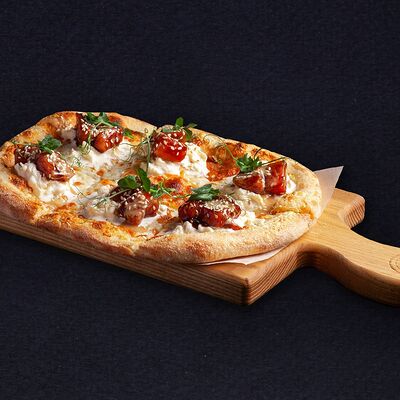 Пицца с тунцом и унаги в Bruno Pizza по цене 540 ₽