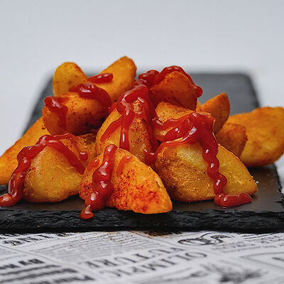 Картофель по-деревенски в SANDI по цене 369 ₽