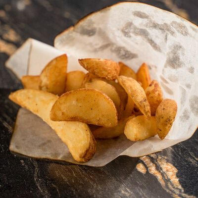 Картофельные дольки в Oзеро гриль по цене 260 ₽