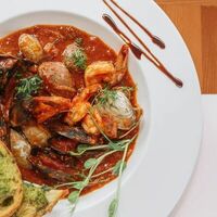 Морепродукты в томатном соусе в Лимончини