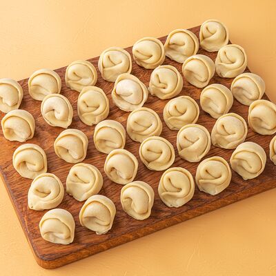 Пельмени с курицей в Бульк по цене 690 ₽