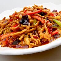Жареная свинина в кисло-сладко-остром соусе в Panda Express