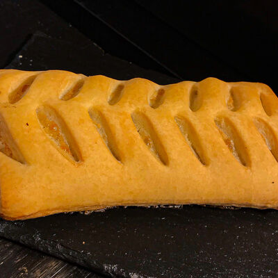 Турновер с сыром и ветчиной в Пекарня Буханка по цене 95 ₽