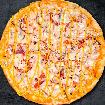 Бургер с курицейв Татмак по цене 1050 ₽