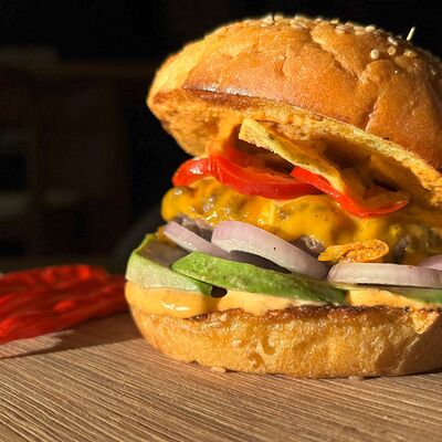 Мексиканский бургер в Geografia по цене 490 ₽