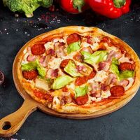 Пицца Фирменная мультизлаковаяв Eat&Drinks Pizza