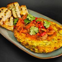 Ароматное жаркое из телячьей вырезки на подушечке из кабачков в Байский