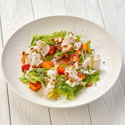 Салат с печеной тыквой и индейкой в Пармезан по цене 595 ₽