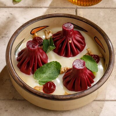 Хинкали с вишней и кокосовой сгущенкой в Асканели Georgian Bistro по цене 560 ₽