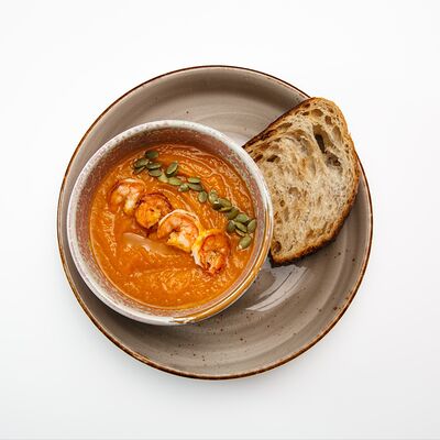 Тыквенный крем-суп с креветками в White Fox Cafe по цене 805 ₽