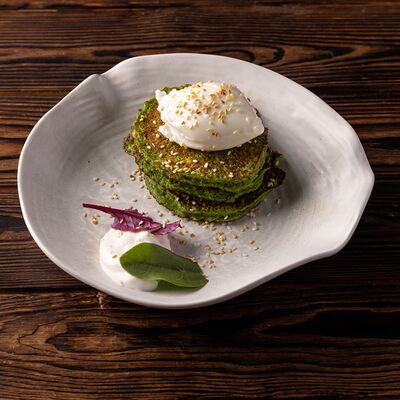 Оладьи из цуккини с яйцом пашот в Luciano по цене 690 ₽
