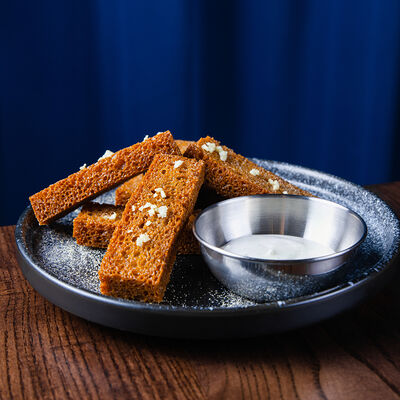 Гренки чесночные в Pafos по цене 270 ₽