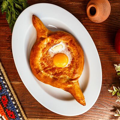 Хачапури по-аджарски в Хинкальня по цене 24 р.