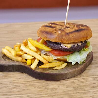 Бургер Говяжий в Хан Кафе по цене 560 ₽