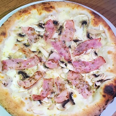 Пицца с беконом и шампиньонами 25 см в La Prima Pizzeria Margherita по цене 680 ₽