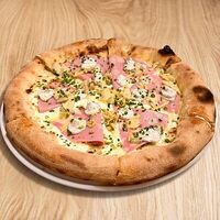 Пицца с мортаделлой, фисташкой и трюфельным кремом в Итальянское бистро Figata