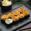 Ролл запеченный с кальмаром и окунем в Omakase Yoshitake Sushi по цене 829