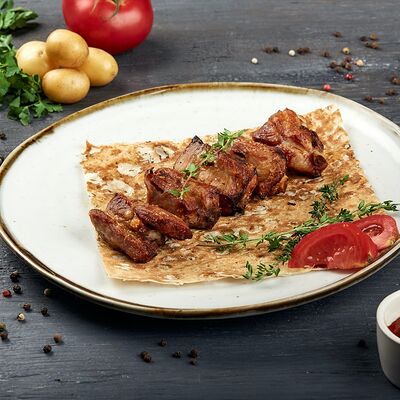 Шашлык из свиных ребер в Мангал по цене 450 ₽