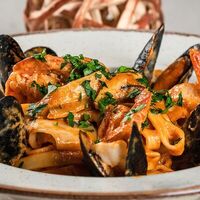 Фетучини Том Ям в Adriano