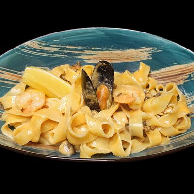Феттуччине с морепродуктами в соусе том ям в Пойдем зайдем по цене 610 ₽