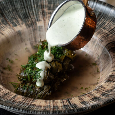 Долма в виноградном листе с мацони в Giorgio Suluguni по цене 720 ₽