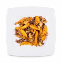 Свинина с картофелем и грибами в Ананас