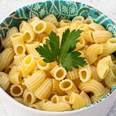Макароны отварные с маслом в Трикатель по цене 94 ₽